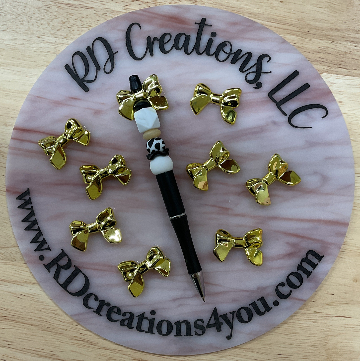 Plastic Gold Bow 32mm